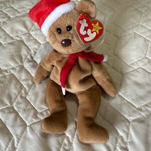 Ty “Teddy” Festive Brown Beanie Bear with Red Santa Hat